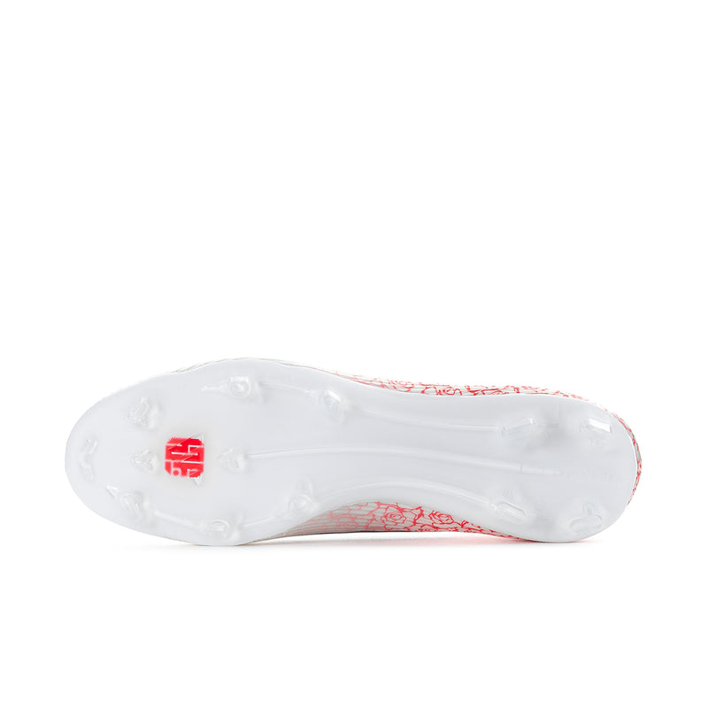 Men's white cleats with molded studs on outsole and red accent on side