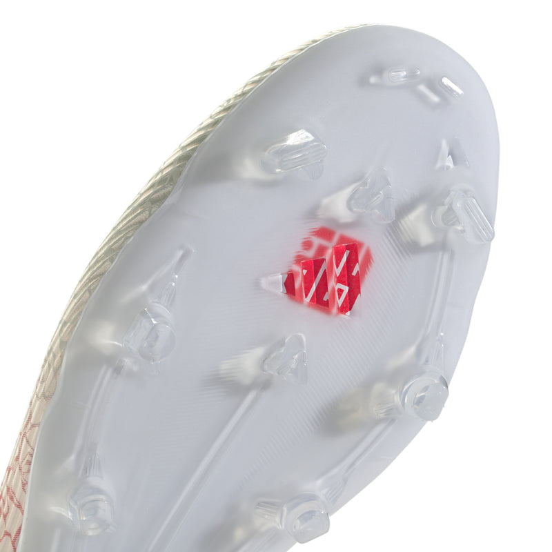 Close-up of men's white cleat outsole with molded FG/MG studs
