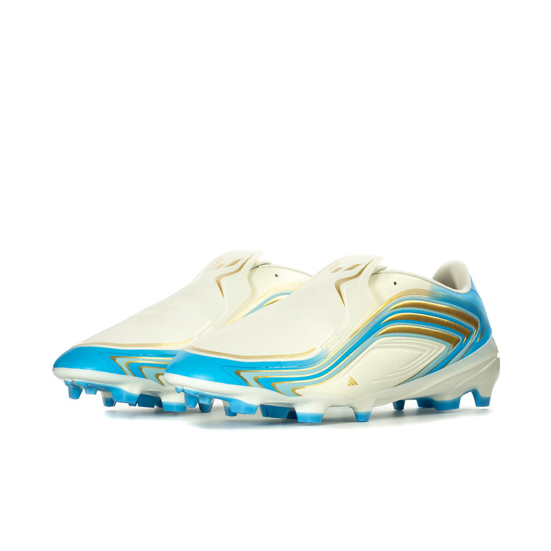Men's low-cut soccer cleat, ivory upper with blue trim and wave stripes, studded sole