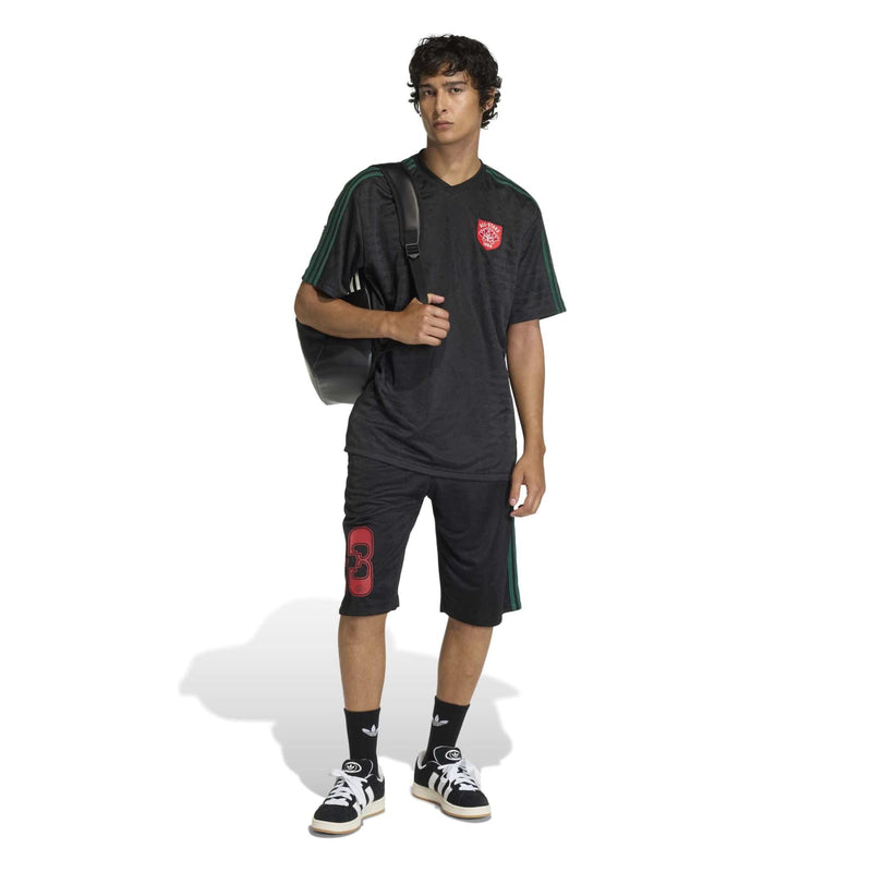 Men's black knee-length shorts with red 83 logo and green stripe detail
