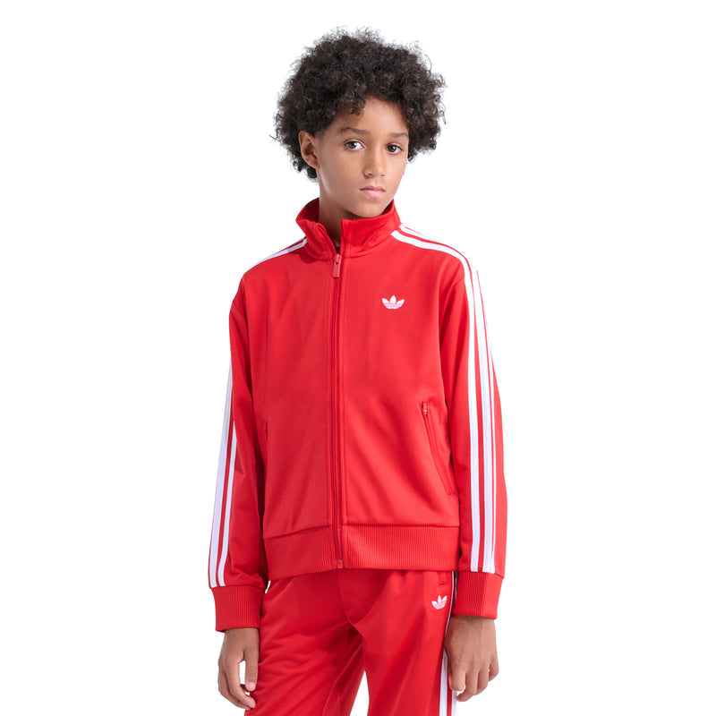 Youth red track jacket on model, full-zip stand collar and white side stripe panels