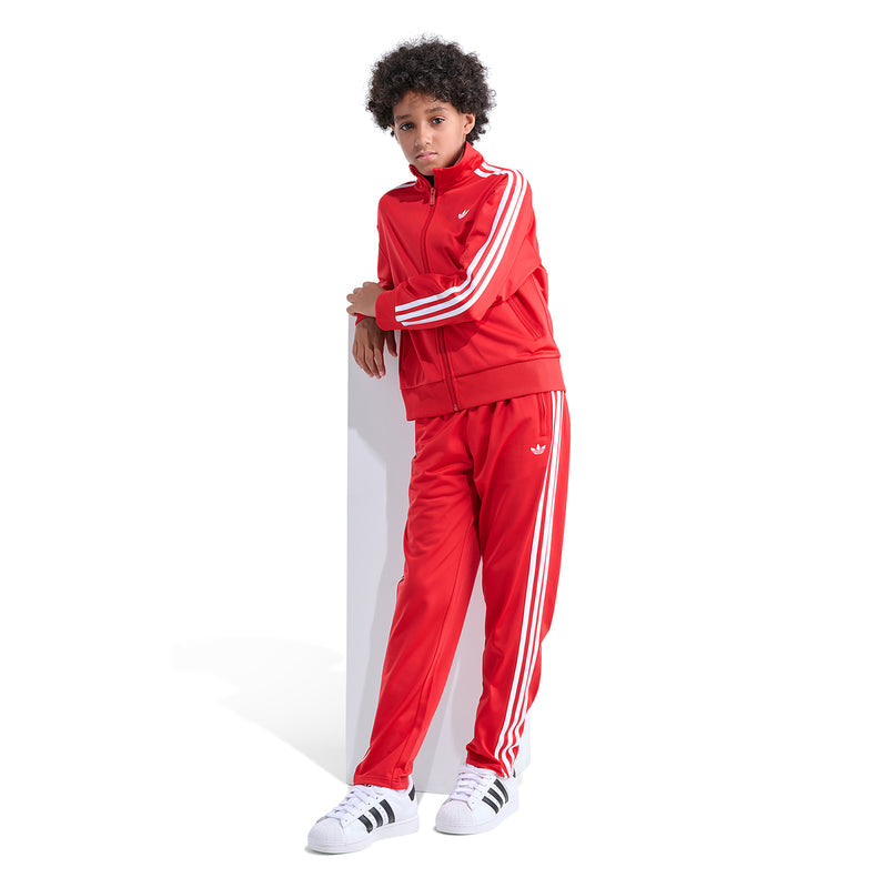 Youth red track jacket with white triple stripes on sleeves and stand collar, full-zip