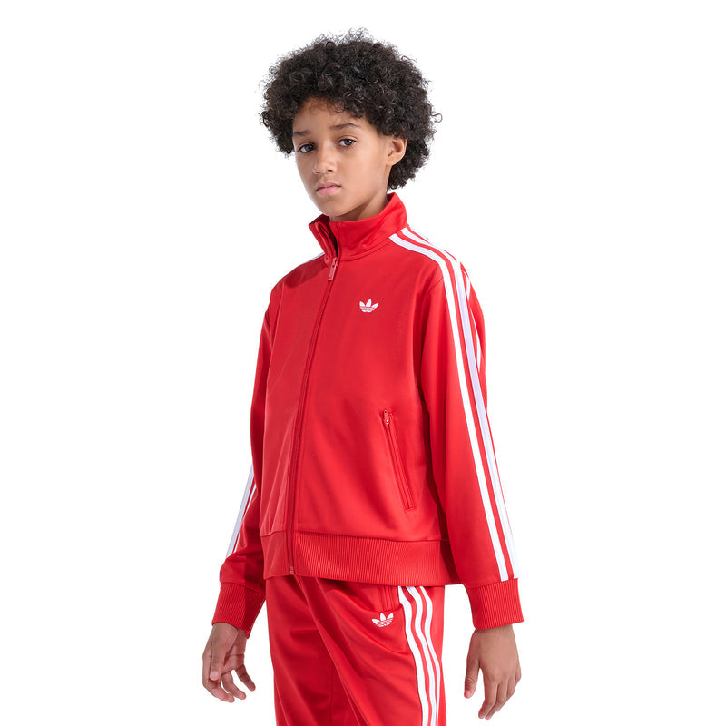 Youth red track jacket with stand collar, full-zip front, and small white chest logo