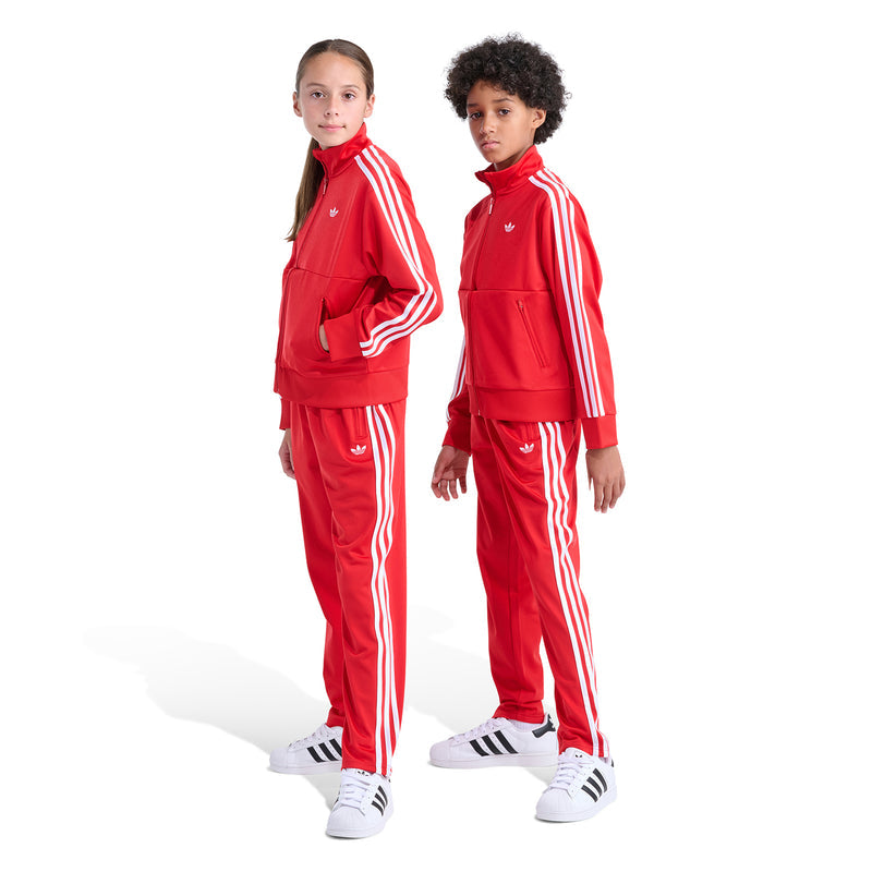 Youth red track pants set with white stripes and small white logo