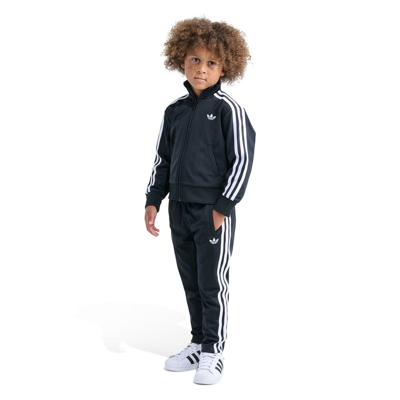Kids black track set with zip-front jacket and white triple stripe pants.