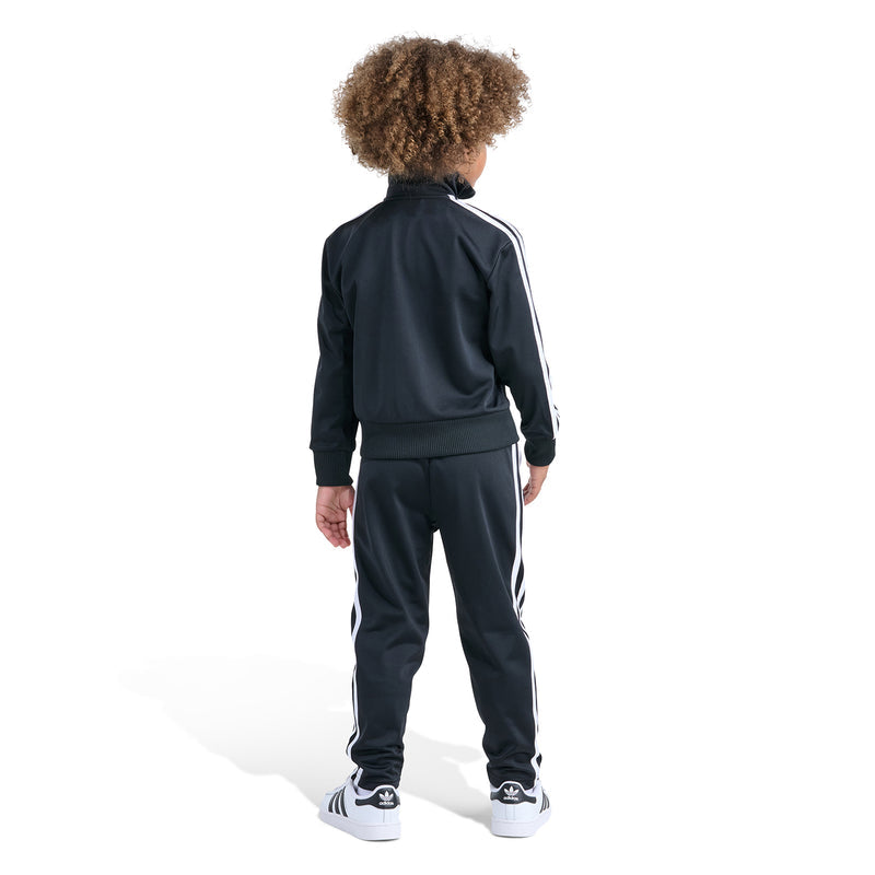 Kids black track set, back view: zip jacket and matching striped pants.