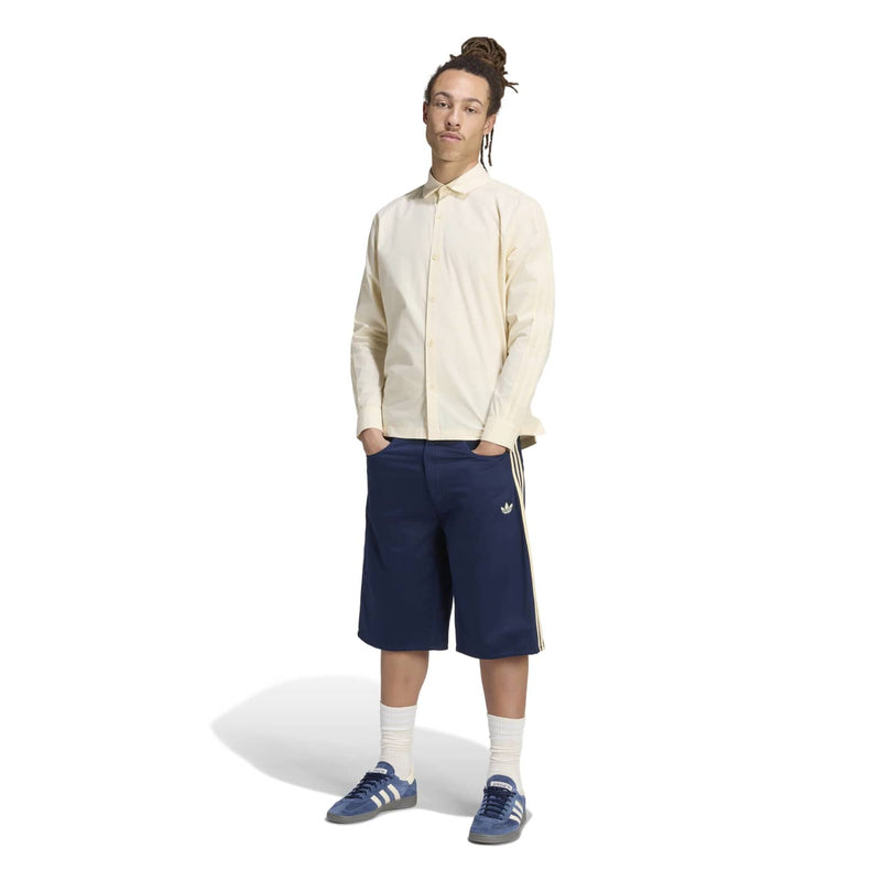 Men's navy twill jorts with side triple stripes, worn mid-thigh length