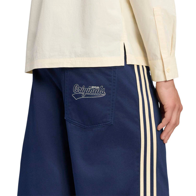 Men's navy twill jorts close-up: back pocket script logo and side triple stripes