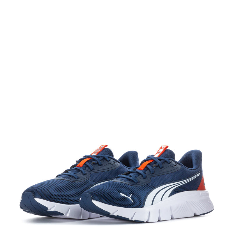 Youth navy lace-up sneakers, white curved logo stripe, orange accents, Puma