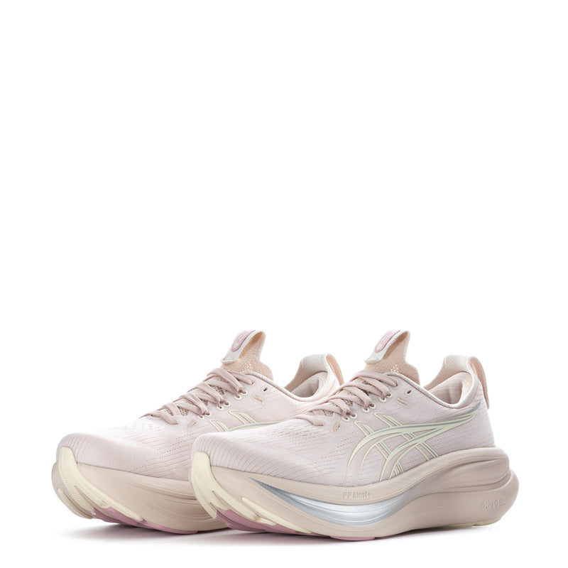 Women's running shoes, light beige/cream, front three-quarter view, cushioned platform sole