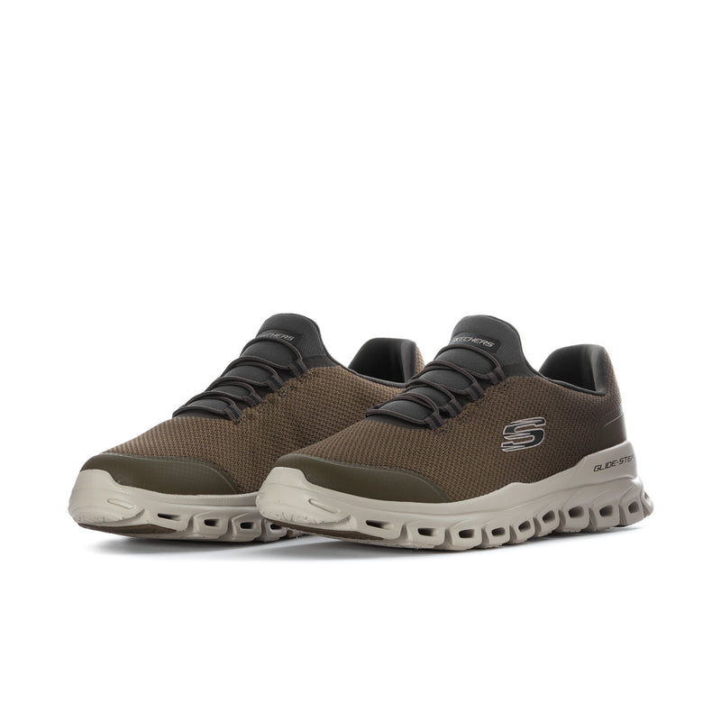 Men's wide olive-brown sneakers, side view with black laces and white rocker outsole