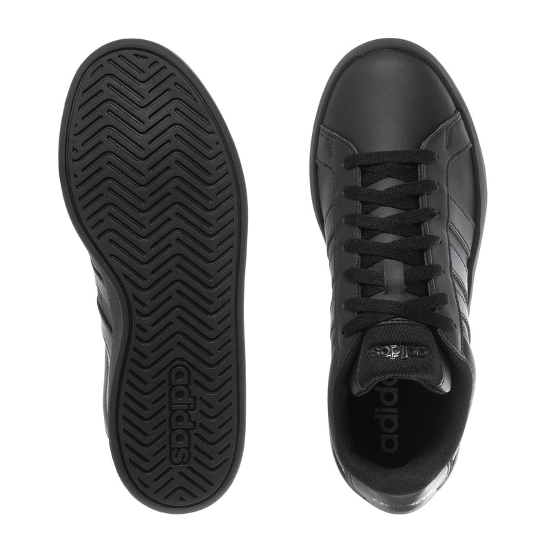 Black youth adidas sneakers with front view and outsole tread detail