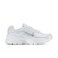 White women's athletic sneakers with padded collar and lace-up front