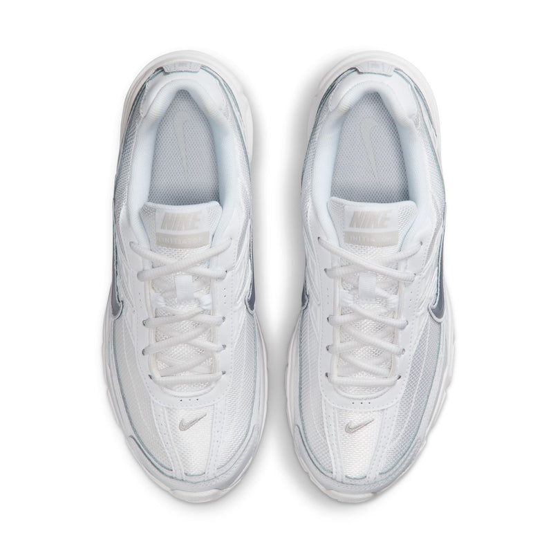 White women's sneakers, front view with mesh upper and lace-up closure