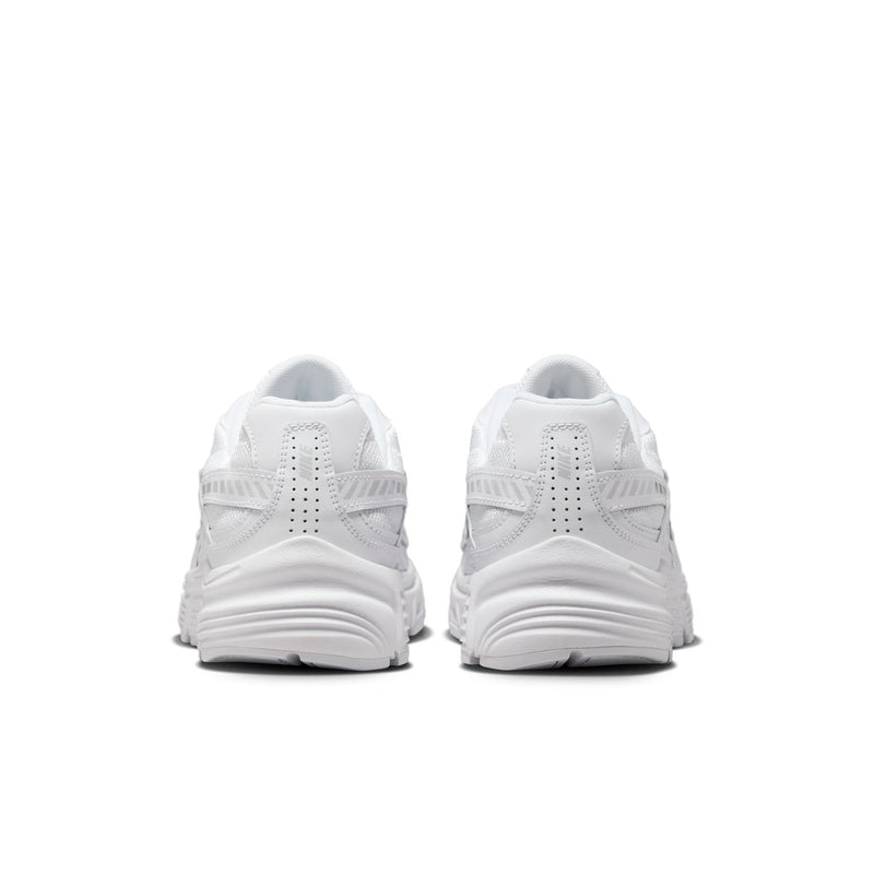 White women's sneakers, heel and back view with cushioned collar