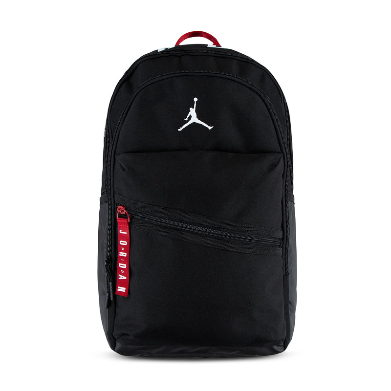 Black backpack with front zip pocket, red label, and Jumpman logo