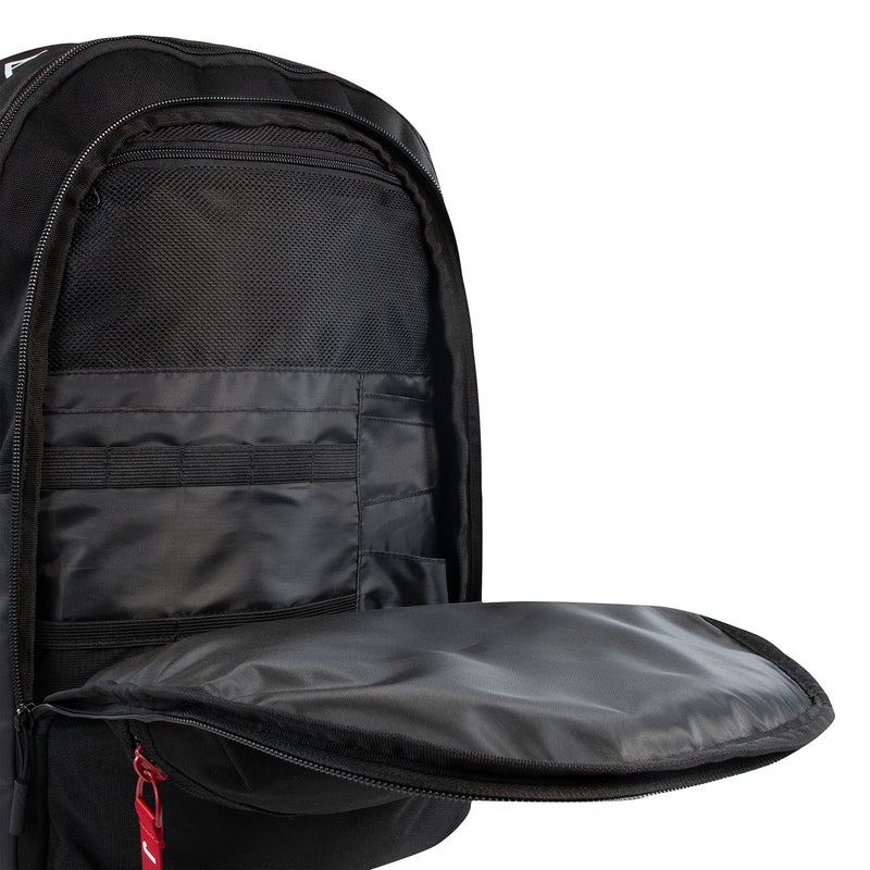 Black backpack interior showing mesh back panel, padded straps, and storage pocket