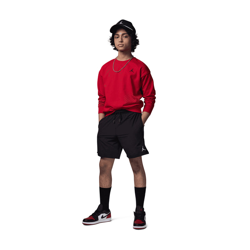 Youth black shorts with elastic waistband, drawstring, and side Jumpman logo