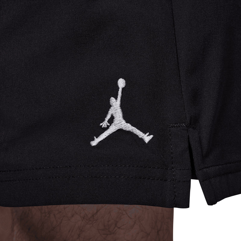 Black shorts with white Jumpman logo on the hem