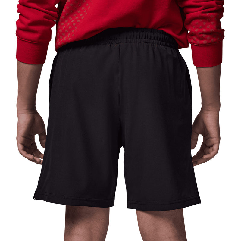 Youth black shorts with elastic waistband and back seam panel detail
