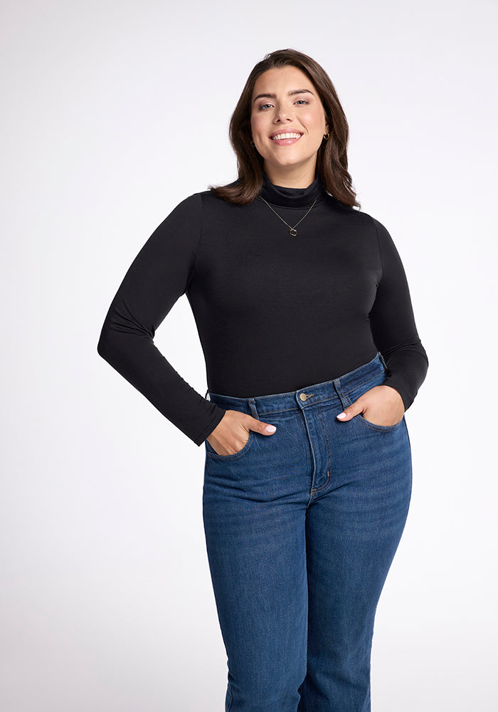 Model wearing Kennedy bodysuit - Black | Juliana is 5'10", wearing a size XL