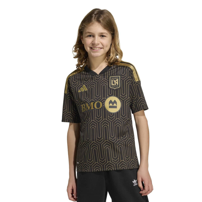 Youth black patterned soccer jersey front with BMO logo, LAFC crest, and gold accents