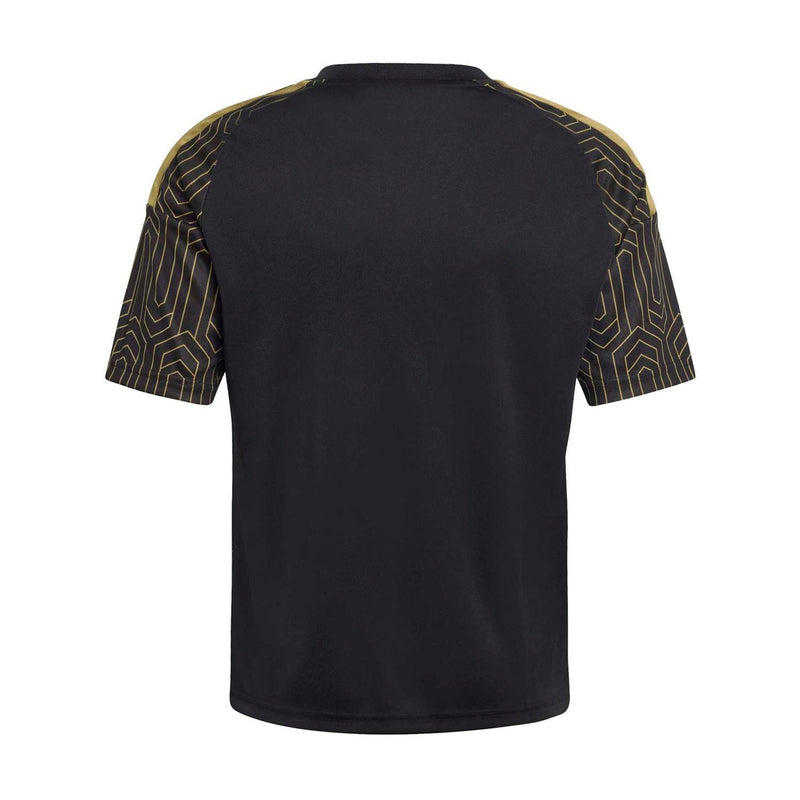 Youth black soccer jersey back with gold geometric pattern on shoulders