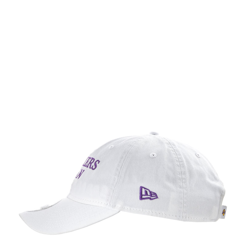 White baseball cap with New Era logo patch on the side