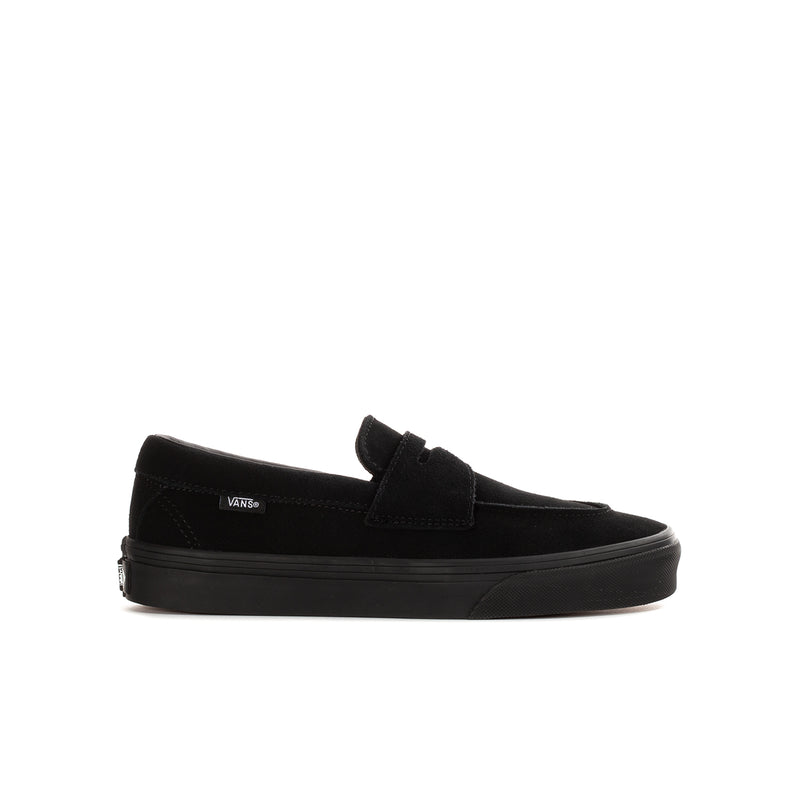 Youth black Vans slip-on loafer with strap and low platform sole