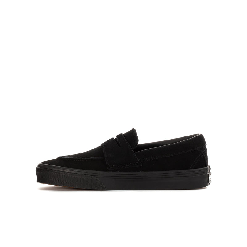 Youth black Vans slip-on loafer, side profile with strap and sole