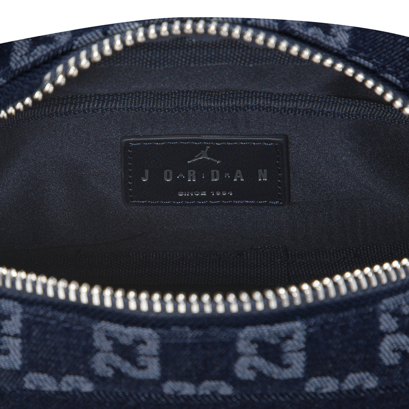 Dark indigo Jordan brand interior label on zip pocket