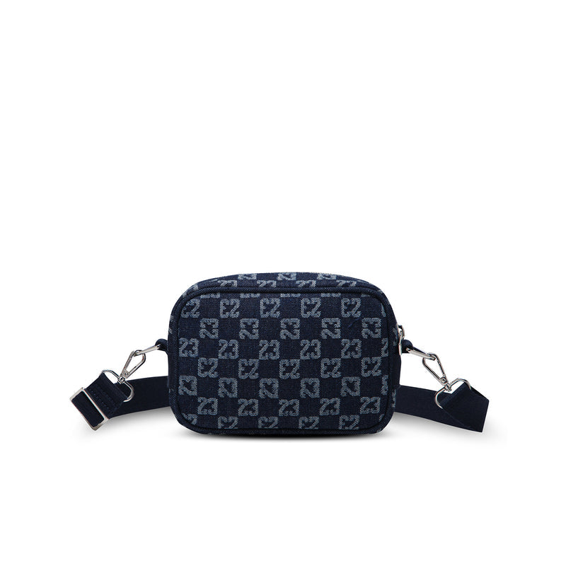 Dark indigo front camera bag with repeating pattern, zip closure, side rings