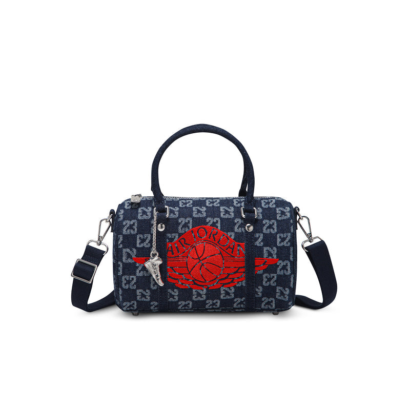 Dark indigo monogram mini duffle bag with red emblem, top handles, and side straps
