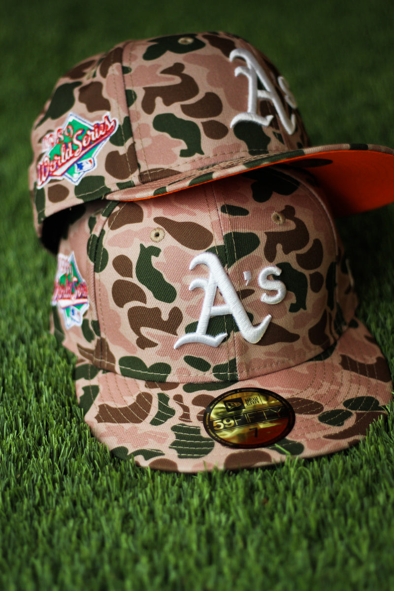 OAKLAND ATHLETICS DUCK CAMO FITTED W/ ORANGE UNDER VISOR