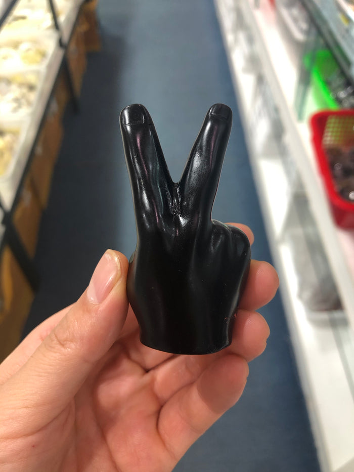Obsidian hand carvings