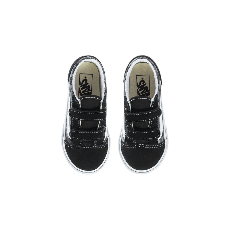 Kids black Vans sneakers with padded collar and gray camo lining, Velcro closure