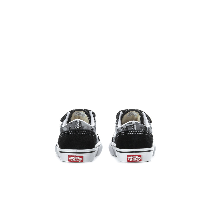 Kids black Vans sneakers back view with white midsole and red logo patch
