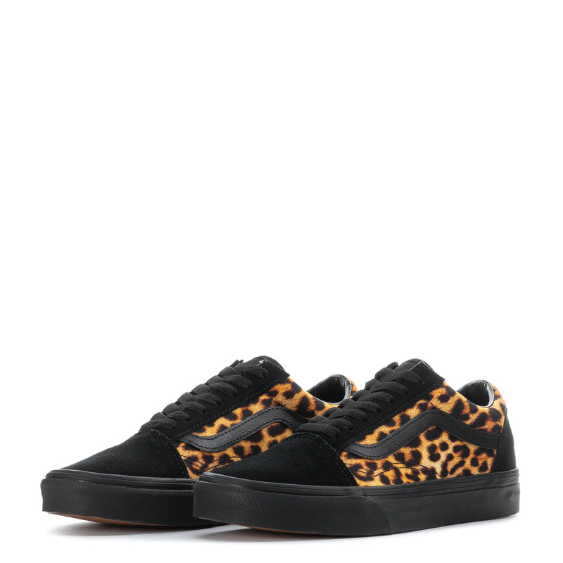 Pair of women's low-top sneakers with leopard print stripe and black laces