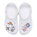 White Crocs-style shoe charms with cartoon character figures, multi-color, pair view