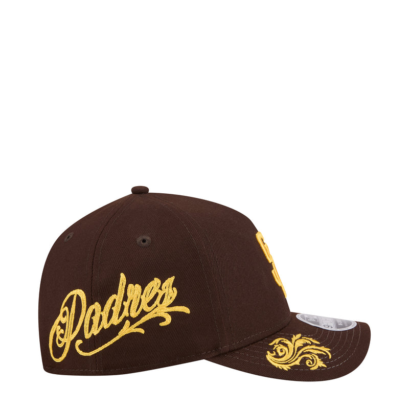Brown baseball cap with yellow Padres wordmark and ornate gold brim embroidery
