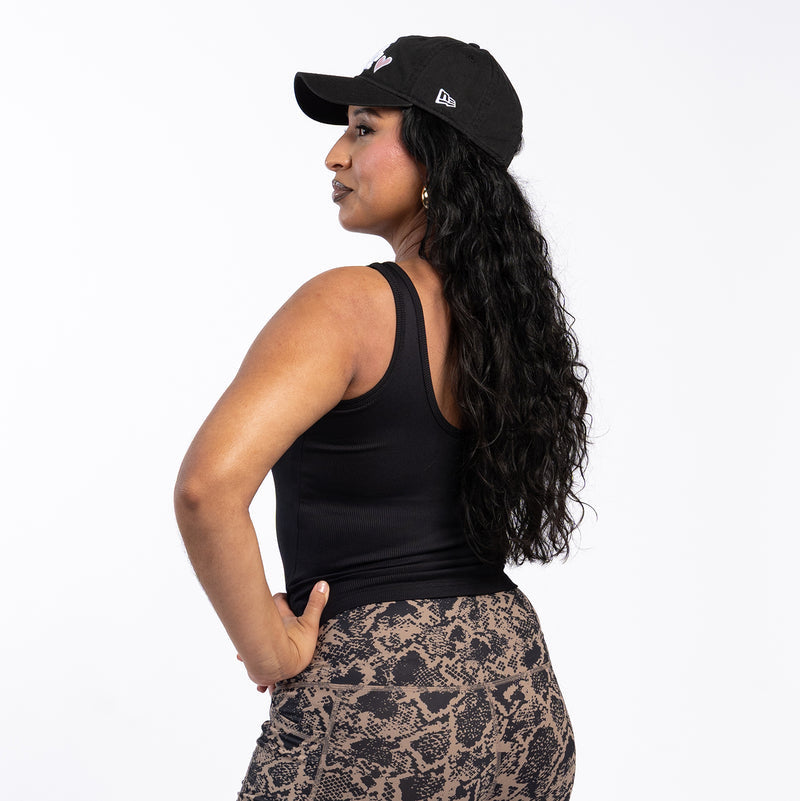 Womens black ribbed sport tank top viewed from side, wide scoop neckline