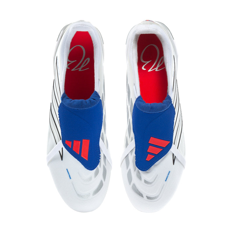 Men's football cleats, white with blue collar and red heel lining, studded sole