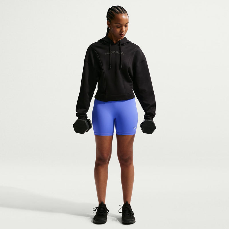 Women's blue 5-inch shorts under black hoodie, side view with Nike Pro band
