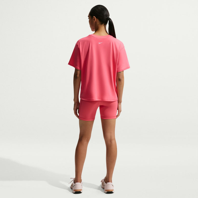 Womens pink Nike Pro 5" shorts on model, back view with small logo