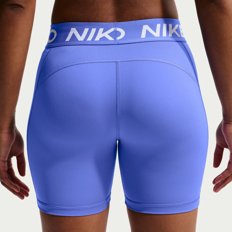 Women's blue 5-inch shorts close-up, Nike Pro waistband and front panel stitching