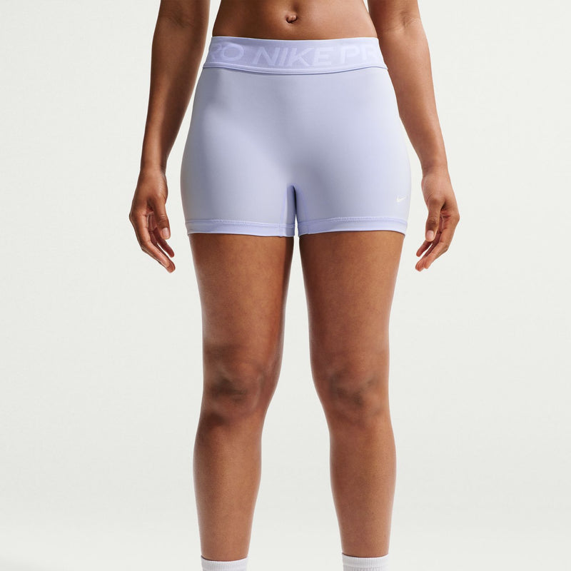Women's Nike Pro 3" shorts in light blue, mid-rise fit with printed waistband logo