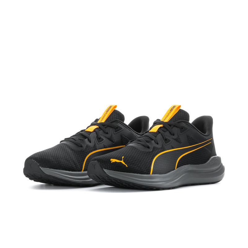 Pair of men's black running shoes with yellow laces and Puma logo accents