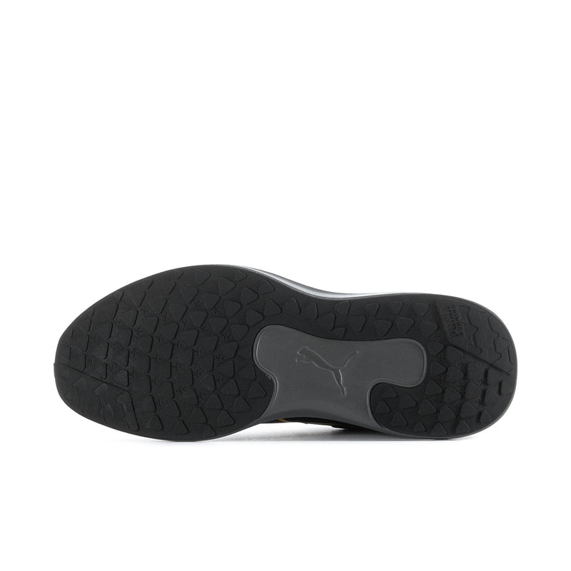 Black rubber shoe outsole with Puma logo and textured tread, bottom view