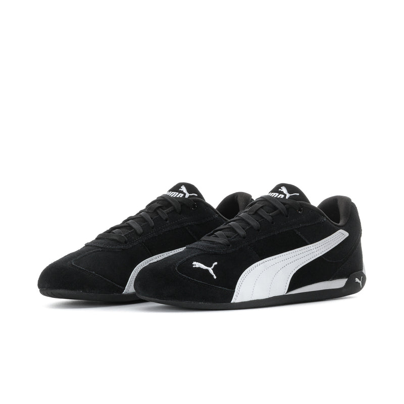 Men's black low-top sneakers, white side stripe and PUMA logo, lace-up.