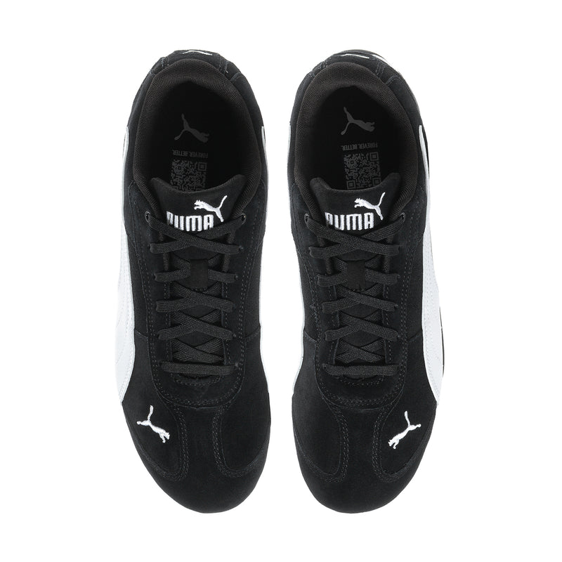 Pair of black sneakers with lace-up front, PUMA logo on tongue and heel.